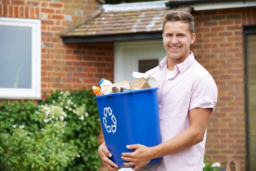Business owner assessing skip size for waste disposal