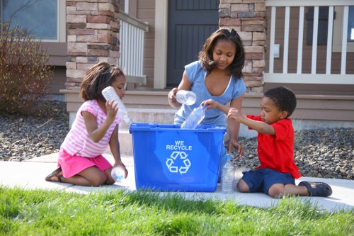 Professional team collecting garden waste